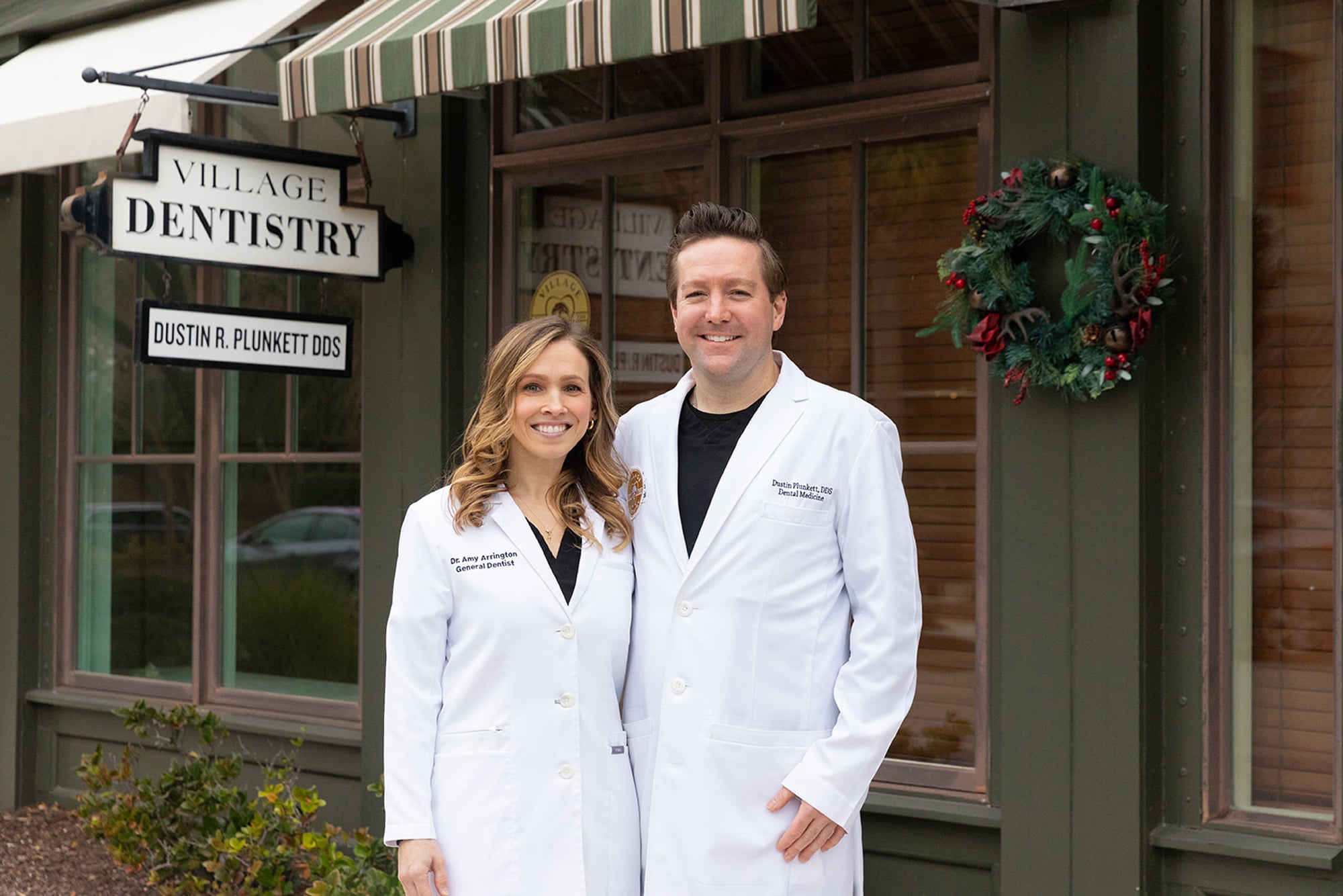 Dr. Arrington and Dr. Plunkett in front of clinic.